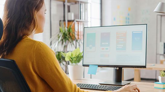 Female Desktop Monitor Desk 546X307 Image